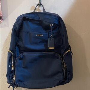 NWOT Tumi Dark Blue unisex Backpack with Gold Accents